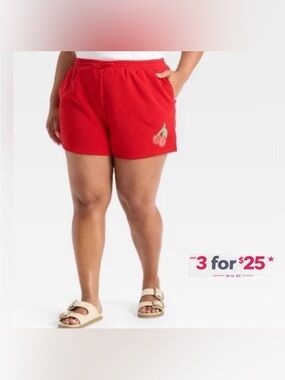 Red sweat shorts with embroidered cherry design drawstring and pockets